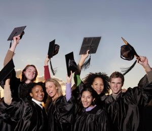 graduates in black caps and gowns